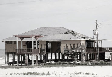 Wind damage - spray foam can help prevent uplift to Stuart roofs